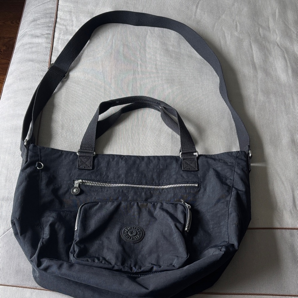 Never used Kipling navy blue Convertible Shoulder Tote with Front Pocket